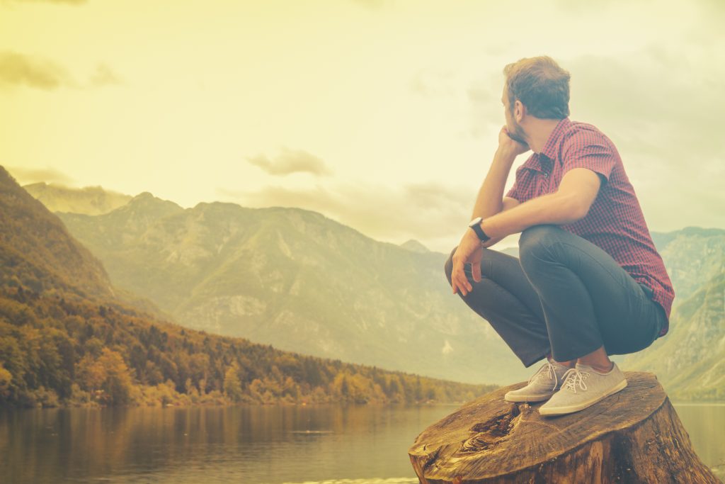 Young man enjoying the freedom in nature.